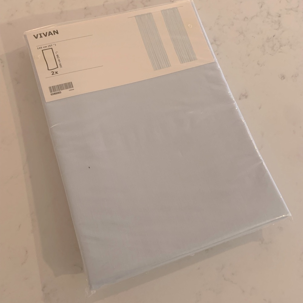 Two Ikea Icy Blue Curtains